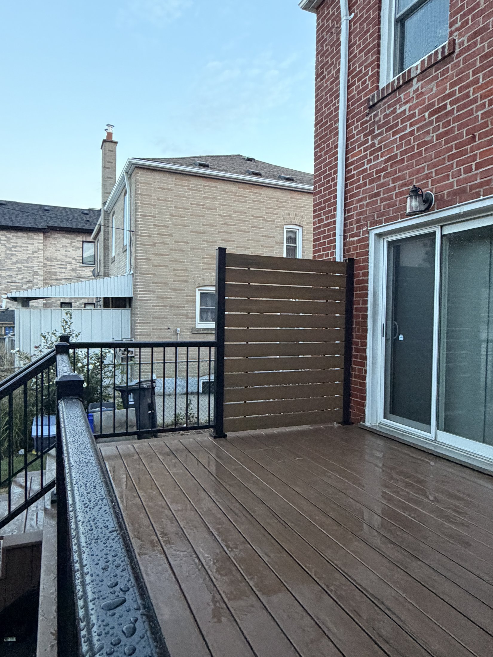 Dark Roast Composite Deck with Privacy Fence — photo 3