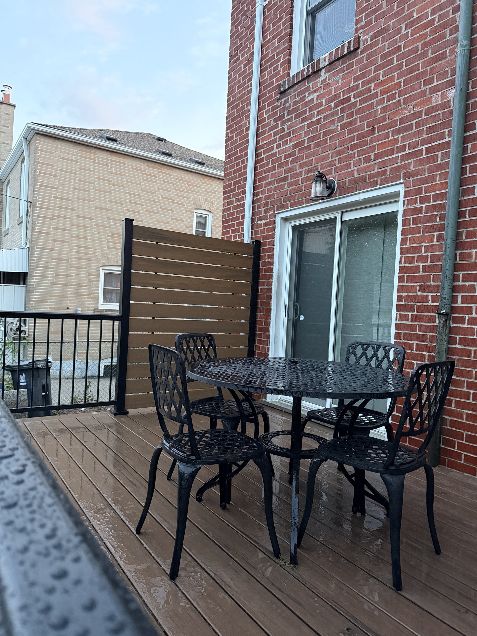 Dark Roast Composite Deck with Privacy Fence — photo 10